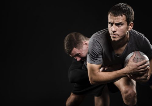 front-view-male-rugby-players-with-ball-copy-space